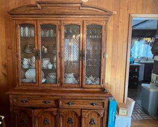 MCM dining set with table, small bar cabinet, breakfront and 8 dining chairs. Breakfront is electrified. If interested in this set, please bring a truck or van and assistance to move it.