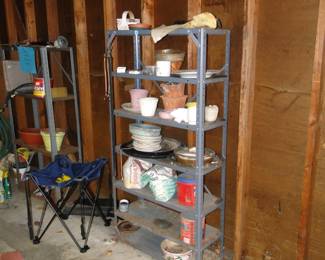 Metal shelf with lots of great planters