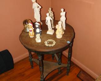 Table and marble statues