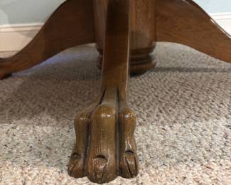 Antique table with unique claw feet