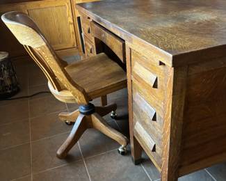 Antique Desk and chair, both is great condition. Chair has wheels and desk has two pull outs