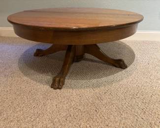 Antique table with unique claw feet