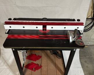 JessEm Router table with 5 speed, 1/2” router, very good condition.  Includes Mast-R-Fence, miter gauge and  anti-kickback devices. Professional grade. 