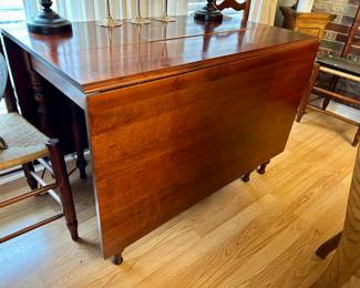 Cherry drop leaf table. 