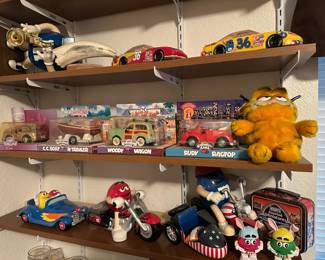 1990's M&M Blue Sax Candy Dispenser, Resin Scrimshaw Whales Tooth with Sperm Whale Etching, 1998 Nascar Skittles Dispenser - #36 Ernie Irvan, 1998 Nascar Grand Prix Candy Dispenser M & M- #36 Ernie Irvan, 2004 Chevron Cars Faith - Breast Cancer Awareness Model Car, 1999 Chevron Cars C.C. Boat N Trailer Model, 1999 Chevron Cars Woody Wagon Model, 1999 Chevron Cars Rudy Ragtop Model, Plush Garfield the Cat, 2002 Ceramic M&M's in Blue Convertible Car Figurine, Red M&M Motorcycle Ceramic Candy Dish, M&M's Red, White & Blue Motorcycle Candy Dispenser, Two Easter Themed Candy Holders, Hershey's Assorted Miniatures Collectible Tin Lunch Box