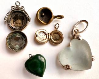 4 Vintage Pendants: 2 Lockets, Glass Heart, Green Stone Heart & Frying Pan
Lot #: 111