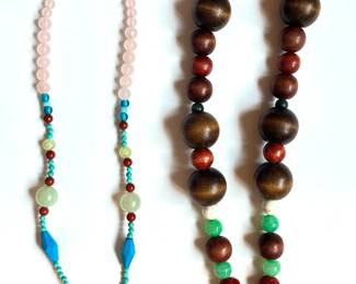 2 Natural Stone Necklaces With Asian Charm & Hippo
Lot #: 11