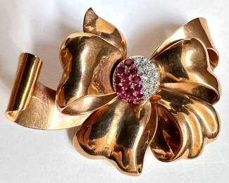 Vintage 14K Gold Bow Pin With Stones
Lot #: 13