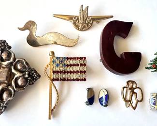 10 Vintage Pins: Sterling Silver, American Airlines Junior Stewardess, Girl Scout Pin & More
Lot #: 142