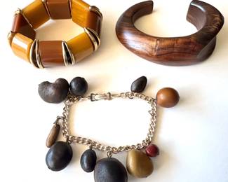 3 Vintage Bracelets: Carved Wood, Bakelite Beads & Nut Charms Made In Germany
Lot #: 63