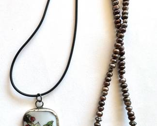 2 Vintage Necklaces: Rope Necklace & Floral Porcelain Pendant
Lot #: 133