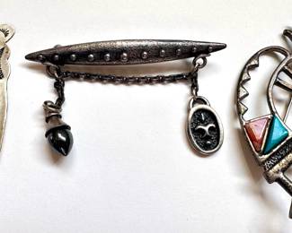 Vintage Sterling Silver: Kokopelli Coral & Turquoise Pin, Navajo Bookmark With Turquoise & Pin With 2 Charmss
Lot #: 29