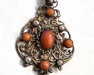 Native American Zuni Necklace & Coral Stone
Lot #: 32