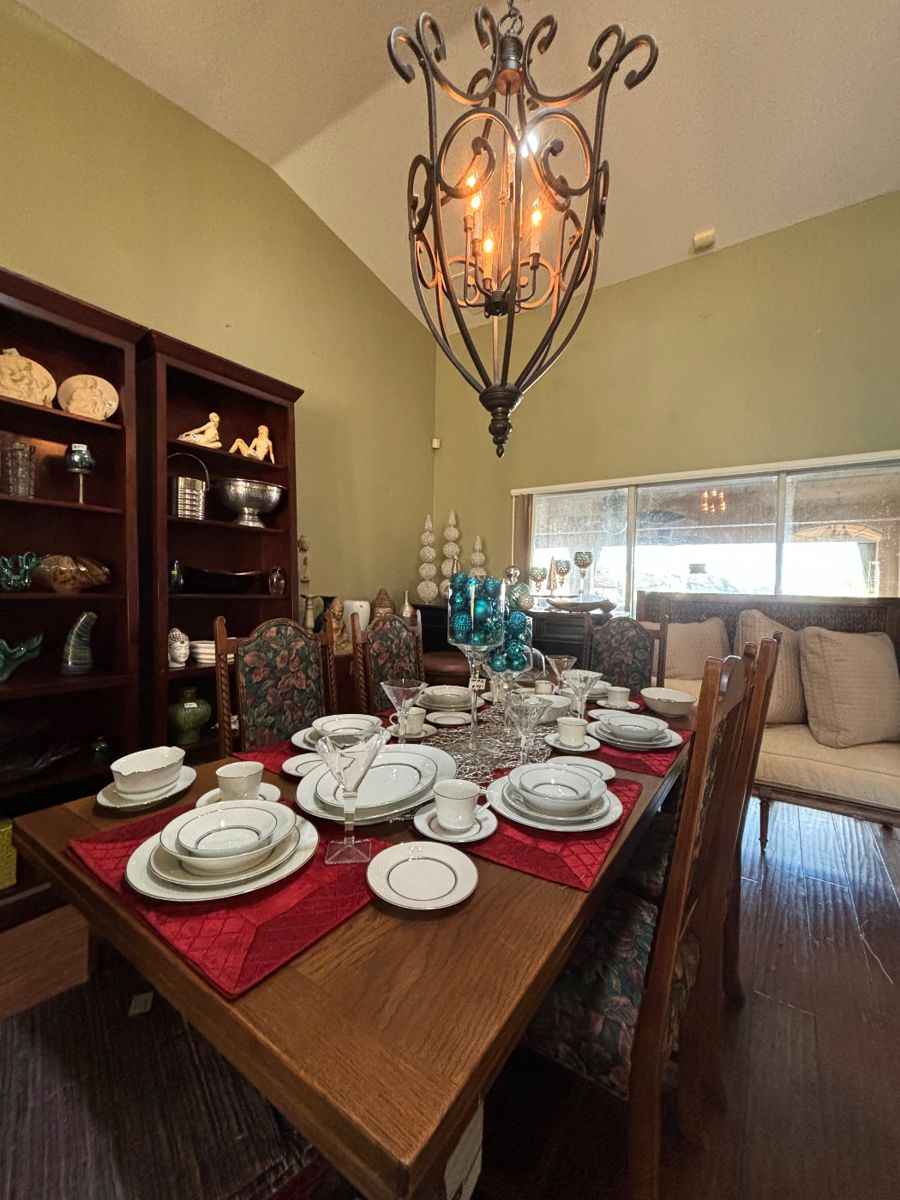 English oak solid wood dining table with pullout extensions and 8 chairs. 