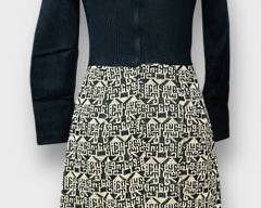 Vintage 1960s Mod Knit Dress With Geometric Print And Fringe Hem. Black And Gold. Long Sleeves. Front Zip Closure. Size Small.
