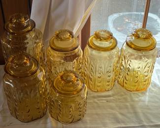 Harvest gold glass canisters