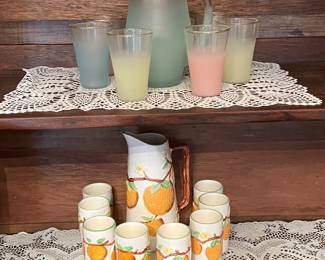 Vintage drinkware; vintage juice pitchers and glasses; Blendo frosted pitcher and glasses; Napcoware Japan juice 1905s Orange-themed pitcher and juice glasses