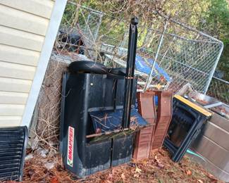 Small Black Trailer, Metal Ramps, Large water tank, of unknown origin.