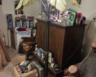 This is a vintage TV Console. Sorry, the palm tree lamp sold.