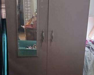 Locking Steel Locker Cabinet with Outside Mirror. At least one of the three of these we have at the sale has a key.