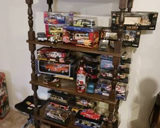 Multishelf Display or Book Shelf. Lots of Diecast Cars, new in boxes,