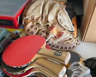 Ping pong paddles and baseball mit