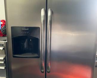 Frigidaire side by side stainless steel refridgerator