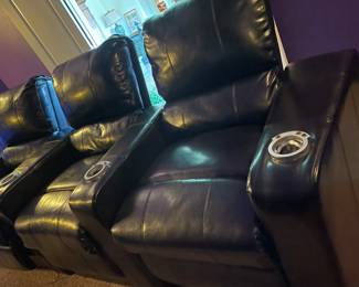 Set of three theater seats. Leather in great condition 