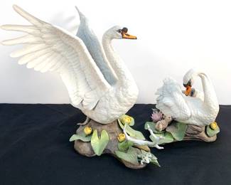 Lot # 47	$250.00	PAIR OF BOEHM PORCELAIN "MUTE SWANS"	Height 17.5, width 15.5, depth 9 in: Height 10 in, width 13 in, depth 12 in. Pair of Boehm Porcelain Mute Swans. Only 400 pairs of these swans were produced. Boehm porcelain sculptures are widely considered some of the finest and most detailed flora and fauna studies ever made.  Prominent institutional collections include the White House, Vatican, Smithsonian, and Buckingham Palace.	Bid at Woodardlipe.com or call 314-899-0098 for more information.