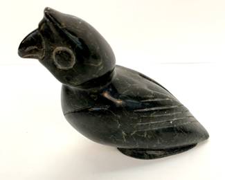 Lot # 4	  $25.00	MID CENTURY INUIT SOAPSTONE BIRD STATUE	Height 6 in, width 6 in, depth 3 in. Vintage soapstone sea bird sculpture with original tag stating "Canada Eskimo Art" signed and numbered on the bottom. #520600.	Bid at Woodardlipe.com or call 314-899-0098 for more information.