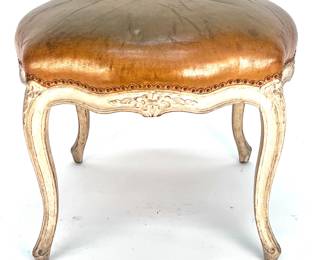 Lot # 41	$200.00	FRENCH LOUIS XV LEATHER STOOL WITH CABRIOLE LEGS	Diameter 23 in, height 18 in. Antique stool with authentically distressed leather top in fawn and original burlap seat webbing underneath. Condition: distressed, separation to leather surface.  Original burlap strapping and fill.	Bid at Woodardlipe.com or call 314-899-0098 for more information.