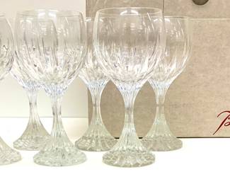 Lot # 62	$400.00	BACCARAT CLEAR CRYSTAL MASSENA RED WINE GLASS SET (6)	"Height, 7.25 in., diameter 3.5 in.; Baccarat Massena Champagne Flute is fully crafted by hand, showcasing Baccarat’s craftsmanship to the fullest. Deep orgue bevel cuts are etched into the clear crystal, running from the foot of the glass to the base of the bowl. The upper half of the flute’s polished silhouette stands out in sharp relief to the detail below.
Original packaging.  Condition, Very Good; no chips to either the rim or base, clear and unetched."	Bid at Woodardlipe.com or call 314-899-0098 for more information.