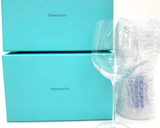 Lot # 9  	$50.00	TIFFANY & CO. CONNOISSEUR SYRAH WINE GLASS SET (2)	Height 10 in., diameter 4 in. New in Box, Tiffany Connoisseur Syrah Wine Glass Set (2) is a perfect goblet set to sample the fall harvest or anything that the cellar has in store.  	Bid at Woodardlipe.com or call 314-899-0098 for more information.