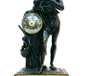 Lot # 101	$750.00	19TH CENTURY FRENCH FIGURAL BRONZE AND SIENNA MARBLE MANTEL CLOCK	Height 21 in., width 12 in., depth 7 in. Large Hanger in patinated bronze with decoration in the round of Silenus feeding the young Bacchus, leaning on the tree trunk supporting the movement in gilded bronze.  Large Sienna marble plinth. Empire period. Report: no major issues, glass is perfect, minor wear on plinth.	Bid at Woodardlipe.com or call 314-899-0098 for more information.
