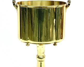 Lot # 13	$50.00	BRASS METAL STANDING CHAMPAGNE BUCKET 	Height 28.5 to top of handle, width 12.25 in, depth 8.5 in. Standing champagne or wine bucket with handle is gold with some distressing consistent with use. 	Bid at Woodardlipe.com or call 314-899-0098 for more information.
