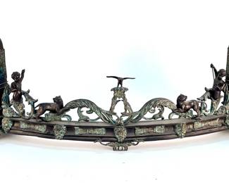Lot # 44	$400.00	MAITLAND SMITH FIGURAL PUTTI BRONZE FIREPLACE FENDER	Length 40 in., height 15 in., depth 5 in. Italian Renessaince Inspired Maitland Smith Solid Bronze Fireplace Fender adorned with playful neoclassical  putti and panthers and a soring eagle crest and pierced and scrolling acanthus.  Condition: very good. No issues to report.	Bid at Woodardlipe.com or call 314-899-0098 for more information.