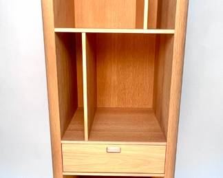 Lot # 39	$500.00	NAVER COLLECTION AK-2772 ADJUSTABLE MODERN STYLE OAK BOOKSHELF WITH DRAWER	Height 60.5 in, width 18.5 in, depth 18.5 in. Mid-Century Modern Danish Furniture Maker with high attention to detail and pride of workmanship. The AK 2772 Cabinet gives plenty of storage and the shelves can be mounted horizontally and vertically. Condition: excellent. 2772 shelving is designed by Nissen & Gehl MDD.	Bid at Woodardlipe.com or call 314-899-0098 for more information.