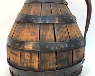 Lot # 52	$200.00	19TH CENTURY FRENCH ALSACIAN WOOD AND IRON WINE PITCHER	Height 14 in., diameter 12 in. Wood pitcher with hand hammered iron ribbing and attached handle cradling coppered slats.	Bid at Woodardlipe.com or call 314-899-0098 for more information.