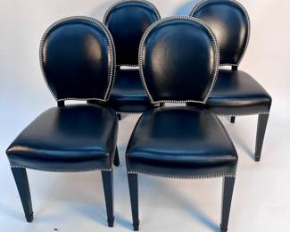 Lot # 97	$10,000.00	RALPH LAUREN "DUKE" DINING SIDE CHAIRS IN STUDDED BLACK LEATHER, SET OF 8	Height 37.5 in, width 22.25 in, depth 24.5 in. Subtle contours enhance the classic silhouette of Ralph Lauren’s Duke dining side chair, which is crafted from solid wood and hand-upholstered in natural English cowhide. Polished nailhead trim affords an elegant finish. Condition: excellent, like new. 