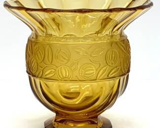 Lot # 54	$50.00	ATTR. TO JOSEF INWALD (CZECHOSLOVAKIAN 1837-1906) ART DECO MOLD BLOWN AMBER GLASS VASE	Height 7.5 in., diameter 8.5 in.  Art Deco Amber two part mold blown amber glass fluted bowl or wide rimmed vase having a ribbon faceted designed base with a prominent acid etched leaf and berry motif band.	Bid at Woodardlipe.com or call 314-899-0098 for more information.