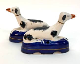 Lot # 50	$250.00	FIVE ITALIAN GLASS MURANO BIRDS ON BRANCH BY GIULIANI TOSI, 1942	Height 6.25 in, width 12.5 in, depth 7 in. A signed glass sculpture of 5 colored glass birds on a clear glass branch with green striping designed by Italian artist, Giuliano Tosi.	Bid at Woodardlipe.com or call 314-899-0098 for more information.