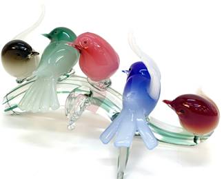 Lot # 50	$250.00	FIVE ITALIAN GLASS MURANO BIRDS ON BRANCH BY GIULIANI TOSI, 1942	Height 6.25 in, width 12.5 in, depth 7 in. A signed glass sculpture of 5 colored glass birds on a clear glass branch with green striping designed by Italian artist, Giuliano Tosi.	Bid at Woodardlipe.com or call 314-899-0098 for more information.