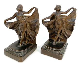 Lot # 10	$50.00	PAIR ART DECO LOIE FULLER DANCING BOOKENDS	Height 7 in., width 3.5 in., depth 3.75 in., Circa 1920 Loie Fuller Dancing female cast bronzed white metal matching bookends. Condition is Very good with no damage reported or large scratches to surface.  Beautiful Art Deco design, figural sculpture in period dress and headband.	Bid at Woodardlipe.com or call 314-899-0098 for more information.