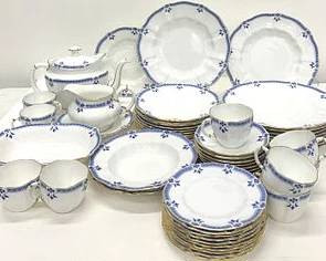 Lot # 121	$3,000.00	57 PIECE GRENVILLE 22 CARAT GOLD ROYAL CROWN DERBY ENGLISH BONE CHINA SET, FULL SERVICE FOR 10	Royal Crown Derby Grenville is a pattern of bone china tableware and giftware that features a halcyon blue floral and foliate rim band and 22 carat gold trim. Individual items include: 10 dinner plates, 10 sandwich plates, 10 dessert plates, 10 tea cups and saucers, lidded tea pot, gravy boat and saucer, 2 serving bowls 8.5 in., 1 casserole 9 in. X 6 in.	Bid at Woodardlipe.com or call 314-899-0098 for more information.