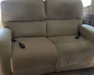 The remote control recliner matches the 3-seater in the basement.  Combined, they are L-shaped
