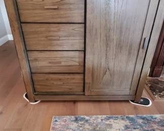 Newer Cabinet with 5-drawers and a sliding door 