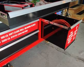 No tools, nor cords come with the craftsman cabinet.