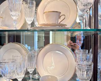 8 place settings of gold rimmed Lenox in excellent condition 