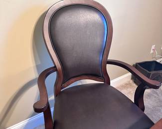Leather office chair in new condition on castors 
$129