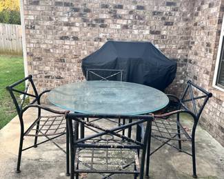 Patio set glass top & heavy metal chairs 
Peeling paint
$199